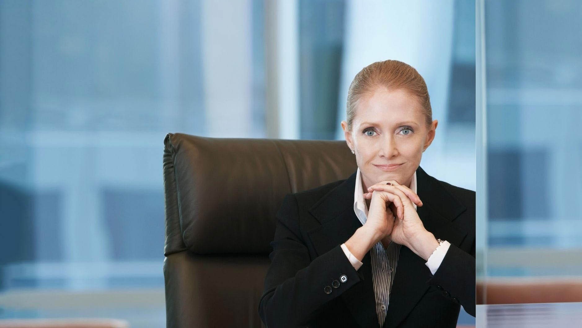 smiling woman in a professional environment