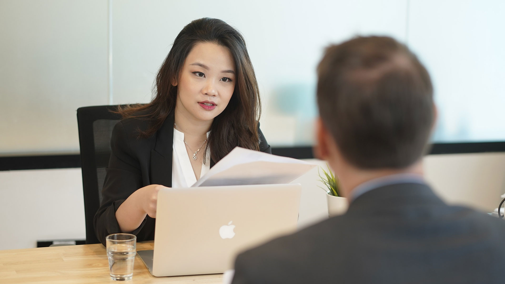 woman interviewing a man
